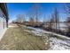 Spacious backyard with grass and some winter snow at 18862 Shefler Blvd, Noblesville, IN 46062