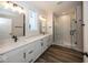 Bathroom with double vanity, large shower, and modern finishes at 18862 Shefler Blvd, Noblesville, IN 46062