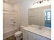 Simple bathroom with shower/tub combo and white vanity at 18862 Shefler Blvd, Noblesville, IN 46062