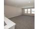 Bonus room featuring grey carpet and large windows at 18862 Shefler Blvd, Noblesville, IN 46062