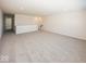 Large bonus room with grey carpet and hallway access at 18862 Shefler Blvd, Noblesville, IN 46062
