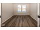 Bright office features wood-look flooring and large windows at 18862 Shefler Blvd, Noblesville, IN 46062