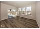 Sunroom with hardwood floors and large windows offering natural light at 18862 Shefler Blvd, Noblesville, IN 46062