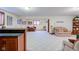 Spacious basement with a bar, dining area, and comfortable seating at 691 Walnut Woods Dr, Greenwood, IN 46142