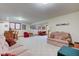 Finished basement includes a bar, dining table, sofas, and chairs at 691 Walnut Woods Dr, Greenwood, IN 46142
