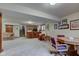 Open basement layout with a game area and bar, providing ample space for recreation at 691 Walnut Woods Dr, Greenwood, IN 46142