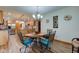 Dining area with wooden table, chairs, and view of kitchen at 691 Walnut Woods Dr, Greenwood, IN 46142