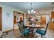Cozy dining area connecting to kitchen and living spaces with stylish decor at 691 Walnut Woods Dr, Greenwood, IN 46142