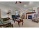 Comfortable living room with fireplace, vaulted ceilings, carpet and traditional decor at 691 Walnut Woods Dr, Greenwood, IN 46142