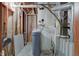Utility room featuring a water softener and HVAC, ensuring efficient home maintenance systems at 691 Walnut Woods Dr, Greenwood, IN 46142