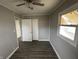 Spacious bedroom with wood-look floors and double door closet at 728 Lonsvale Dr, Anderson, IN 46013