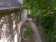 Shot of the backyard showing a walking path leading to the backyard at 9943 Irishman'S Run Ln, Zionsville, IN 46077