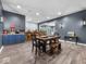 Finished basement area with bar and table, perfect for entertaining or relaxing with the Gathering at 9943 Irishman'S Run Ln, Zionsville, IN 46077