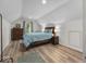Attic bedroom with hardwood floors, pitched ceilings, and a quaint and relaxing atmosphere at 9943 Irishman'S Run Ln, Zionsville, IN 46077