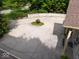 Circular driveway entrance with brick accents and manicured central landscape feature at 9943 Irishman'S Run Ln, Zionsville, IN 46077