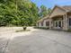 Brick home featuring a spacious front yard and an expansive driveway at 9943 Irishman'S Run Ln, Zionsville, IN 46077