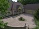 Stately brick home featuring a spacious front yard and an expansive three-car garage at 9943 Irishman'S Run Ln, Zionsville, IN 46077
