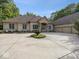 Beautiful home with a large driveway, three-car garage and manicured landscaping at 9943 Irishman'S Run Ln, Zionsville, IN 46077