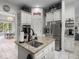 A kitchen with a central island featuring a sink, stainless steel refrigerator, and a 'pantry' sign at 9943 Irishman'S Run Ln, Zionsville, IN 46077