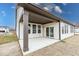 A covered back porch with a concrete slab at 4982 Reavie Ct, Noblesville, IN 46062