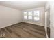 Bright bedroom featuring three windows, and plenty of space at 4982 Reavie Ct, Noblesville, IN 46062