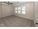 Bright bedroom with three large windows and neutral gray carpet at 4982 Reavie Ct, Noblesville, IN 46062