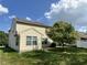 Backyard with green grass and a patio, perfect for outdoor entertaining and relaxation at 1946 Central Park W Blvd, Greenwood, IN 46143
