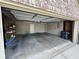Spacious two-car garage with shelving, an automatic door, and ample storage space at 1946 Central Park W Blvd, Greenwood, IN 46143