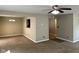 Cozy living room with neutral carpet, ample natural light, and an open layout at 1946 Central Park W Blvd, Greenwood, IN 46143