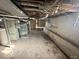 Exposed basement with concrete floor, painted walls, and visible utilities at 234 Ringwood Way, Anderson, IN 46013
