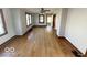Bright living room featuring hardwood floors, neutral walls, and traditional trim at 234 Ringwood Way, Anderson, IN 46013