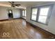 Inviting living room with hardwood floors and plenty of natural light at 234 Ringwood Way, Anderson, IN 46013