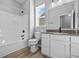 Bathroom featuring a shower, tub, and a vanity sink with modern fixtures at 16920 Cattle Hollow Ln, Noblesville, IN 46060