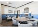 Comfortable sitting area with round tables, chairs, and stylish decor at 168 Velvet Hat Rd, Danville, IN 46122