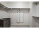Spacious walk-in closet with built-in shelving and a modern dresser for ample storage at 729 Greenford N Trl, Carmel, IN 46032