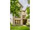 Tan brick exterior with deck, balcony, grill, and green space at 729 Greenford N Trl, Carmel, IN 46032