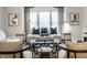 Bright living room with cozy furniture, large windows, and sophisticated accents at 729 Greenford N Trl, Carmel, IN 46032