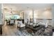 Open concept living and dining area with modern furnishings and ample natural light at 729 Greenford N Trl, Carmel, IN 46032