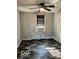 Small bedroom with tile floor and window at 304 Andover Rd, Anderson, IN 46013