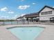 Community clubhouse with a swimming pool, wading pool, lounge chairs, and tables with umbrellas for a resort lifestyle at 231 Lar Lan Dr, Danville, IN 46122