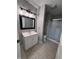 Updated bathroom with white vanity and walk-in shower at 7932 Eagle Valley Pass, Indianapolis, IN 46214