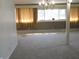 Spacious living room with large window, neutral carpet, and bright natural light at 431 Vestal Rd, Plainfield, IN 46168