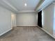 Spacious carpeted bedroom with neutral walls and large window at 3534 Brampton Ln, Westfield, IN 46074