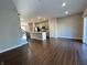 Spacious living room with hardwood floors and kitchen view at 3534 Brampton Ln, Westfield, IN 46074