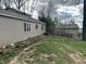 Image of a backyard featuring a well-maintained lawn and surrounding trees at 7934 S 600 W, Edinburgh, IN 46124