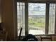 Stunning view from the window showing a rolling countryside with fields and distant buildings at 7934 S 600 W, Edinburgh, IN 46124