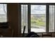 Picturesque countryside view from the window, featuring a mix of lush greenery and distant structures at 7934 S 600 W, Edinburgh, IN 46124