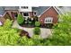 Aerial view of a well-maintained yard featuring mature trees and sculpted greenery at 2838 Silverwood Ln, Greenwood, IN 46143