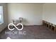 Spacious living room awaiting renovation, ready for personalization and design updates at 4322 Par Dr, Indianapolis, IN 46268