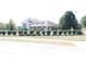Traditional style clubhouse featuring well manicured landscaping, inviting entrance, and dormer windows at 882 Brookshire Dr, Franklin, IN 46131